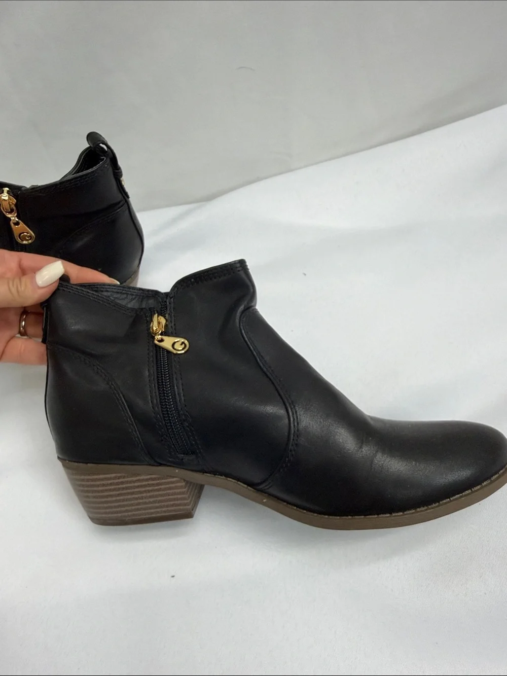 G by Guess Black Leather Ankle Booties with Gold Zip Pull